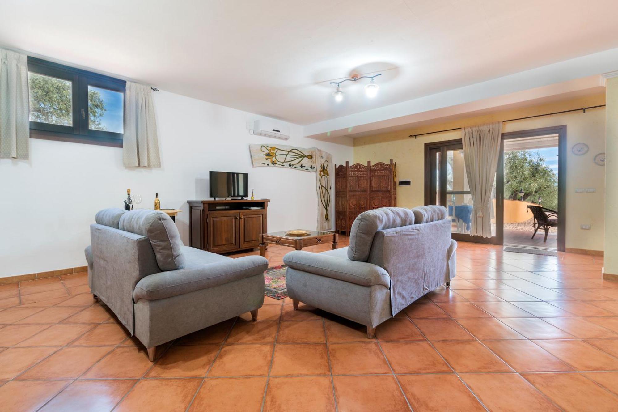 Rustico Degli Ulivi Apartment โอโรเซย ภายนอก รูปภาพ